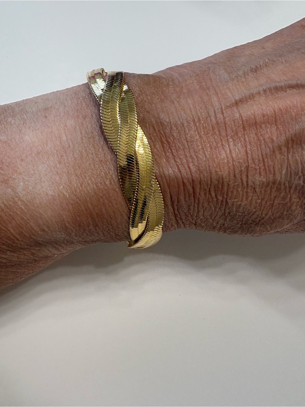 Elegant Gold-Tone Twist Herringbone Bracelet